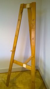 Rustic Pine Easel showing the peg system for holding the display work.